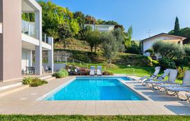 Modern villa with a pool, a garden and lake views in Padenghe sul Garda, Italy for 2,500,000 €