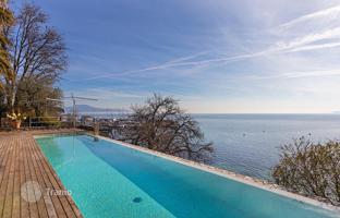 Snow-white villa with a pool and a garden on the lake in Manerba del Garda, Italy for 4,500,000 €