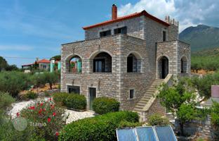 Stone three-storey villa with a garden and sea views in the Peloponnese, Greece for 690,000 €