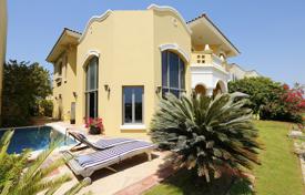 Bright villa with a terrace, a pool, sea views and a private beach, near the golf course, Palm Jumeirah, Dubai, UAE. Price on request