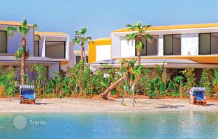 New beachfront villas with a swimming pool in a residence on the islands, The World Islands, Dubai, UAE for $8,174,000