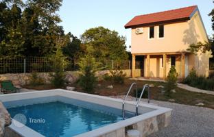 Two two-storey houses with a swimming pool and a garden in Zagora, Krimovica, Montenegro for 180,000 €