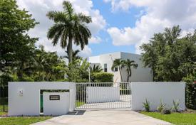 Spacious villa with a backyard, a pool, a relaxation area, a terrace and two garages, Miami, USA for $1,500,000