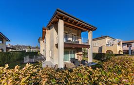 Three-level villa with a garage, a private garden and a shared pool in Manerba del Garda, Italy for 730,000 €
