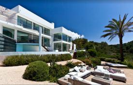 Three-level villa with a view of the mountains, on the first line from the sea, Cala Vedella, Ibiza, Spain for 10,000 € per week