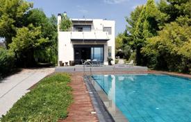 Sea view villa with a swimming pool and terraces at 30 meters from the sea, Chalkida, Greece for 1,700 € per week