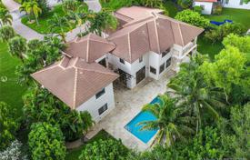 Spacious villa with a garden, a backyard, a pool, a relaxation area, a terrace and a garage, Miami, USA for $1,875,000