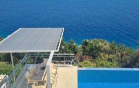 Seafront villa on Kas peninsula, with private beach, panoramic sea views from all rooms and terraces, fireplace, parking for 3 cars barbecue for $1,776,000