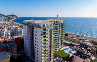 2-bedroom apartment in new building 100 m² in Mahmutlar for 19,990,000 TRY