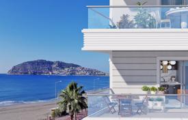 Beachfront apartments in a new premium residence with swimming pools, a garden and a spa area, in the center of Alanya, Turkey for $429,000