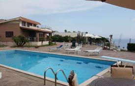 Classical villa with a swimming pool and a direct access to the beach on the first sea line, Anzio, Italy. Price on request
