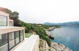 Three-storey villa with a swimming pool and a garden on the first sea line, Kolocep, Croatia. Price on request
