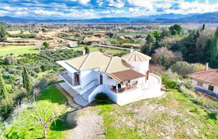 Furnished two-storey house with a nice plot and panoramic views in the Peloponnese, Greece. Price on request
