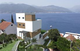 New beachfront villa with a swimming pool and a panoramic view in a quiet area, Krašići, Montenegro for 560,000 €