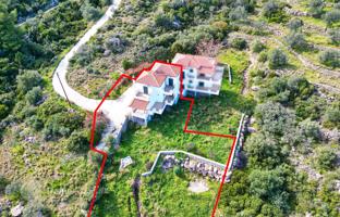 Three-level modern house with a beautiful sea view and a large plot in the Peloponnese, Greece. Price on request
