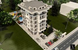 Apartments in a new residence with a swimming pool, a garden and an access to the sea, Alanya, Turkey for $215,000