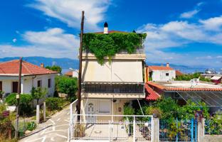 Furnished three-storey townhouse a few steps from the sea in Peloponnese, Greece. Price on request