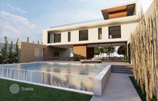 Modern villa with a swimming pool and a sea view at 300 meters from the beach, Larnaca, Cyprus. Price on request