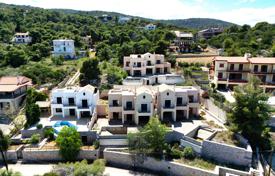Five unfinished townhouses with sea views and swimming pools in the Peloponnese, Greece for 850,000 €