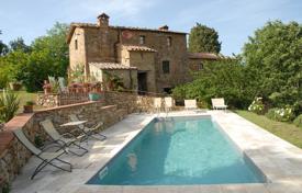 Restored stone villa with a guest house, a swimming pool and a garden, Radicondoli, Italy. Price on request