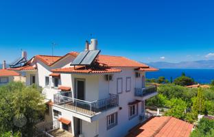 Furnished three-storey townhouse with a garden, a garage and sea views in Peloponnese, Greece for 300,000 €