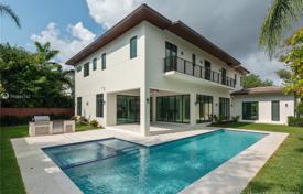 Modern villa with a backyard, a swimming pool, a terrace and two garages, Miami, USA for $3,550,000