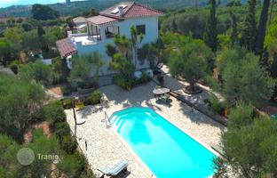 Renovated three-level villa with a pool, a large plot and sea views in Finikounda, Peloponnese, Greece for 585,000 €