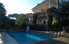 Modern villa with a swimming pool, a tennis court and a view of the sea, Blanes, Spain. Price on request