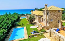 Unique estate with two swimming pools and a view of the sea, 50 meters from the beach, Gargaliani, Greece for 6,500,000 €