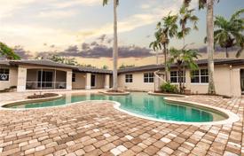 Spacious villa with a backyard, a swimming pool, a seating area and three garages, Miami, USA for $1,649,000