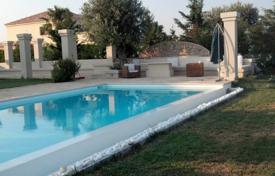 Spacious villa with a swimming pool and a large garden on the first sea line, Porto Heli, Greece for 6,000 € per week