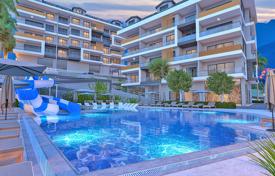 Beautiful apartments in a new residence with a swimming pool, a garden and a parking, in the center of Alanya, Turkey for $320,000