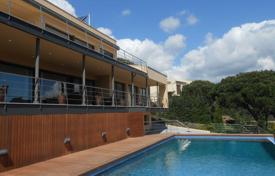 Modern villa with a panoramic view, a swimming pool and a garden in a quiet area, S'Agaro, Spain. Price on request