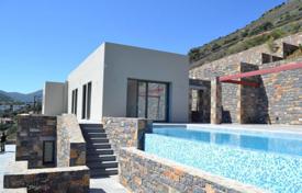 Modern villa with a terrace, a pool, sea views and a spacious plot, near the beach, Elounda, Crete, Greece for 1,650,000 €