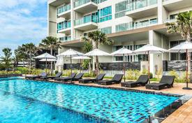 Furnished apartment with a sea view in a comfortable residence with two swimming pools and gardens, on the first sea line, Pattaya for $185,000