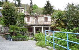 MATULJI, KUĆELI — land 12,000 m² (approx. 6700 m² construction) with sea view + 3 antiques 220 m². Price on request