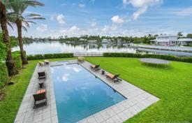 Modern villa with a garden, a backyard, a pool, a summer kitchen, a sitting area, a terrace and three garages, Miami Beach, USA for $14,900,000
