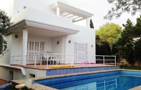 Three-level snow-white villa near the beach in Cala d'Or, Mallorca, Spain for 3,950 € per week