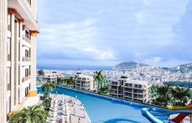 Apartments with a panoramic view in a new gated residence with swimming pools, an aquapark and a cinema, Alanya, Turkey for $207,000