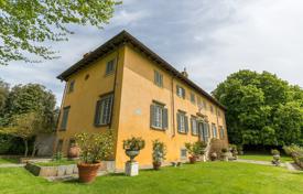 Restored historic villa with a swimming pool, gardens and a helipad in a quiet area, Lucca, Italy. Price on request