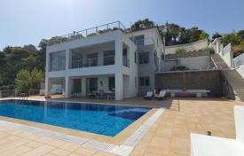Three-storey villa with a swimming pool, terraces and a panoramic sea view, Amoni, Greece for 900,000 €