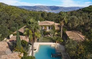 Mediterranean-style villa with a pool and lush garden in Bormes-les-Mimosas, French Riviera, France. Price on request