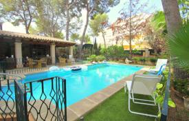 Spacious villa with a separate apartment, terraces, a pool, a patio, a barbecue area, a garage and a garden, Palmanova, Spain for 1,750,000 €