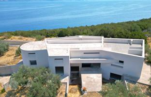 Unfinished villa with a pool and a large plot 100 m from the sea, Epidaurus, Peloponnese, Greece for 980,000 €