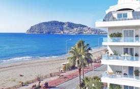 New beachfront apartments in a premium residence with swimming pools and a spa area, in the center of Alanya, Turkey for $347,000