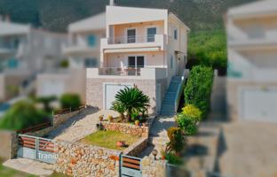 Three-storey townhouse with a garden, a parking and sea views, Peloponnese, Greece for 350,000 €