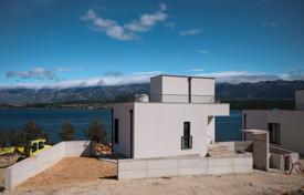 Luxury 230 m² seafront villa in Novigrad, Zadar, 60m from beach, 85% complete, 3 en-suite bedrooms, rooftop terrace for 736,000 €