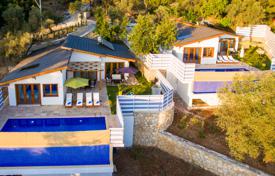 New complex of 3 bungalows (built in 2019) with swimming pools, surrounded by a pine forest, on a plot of 2500 sqm, near Kalkan for $929,000