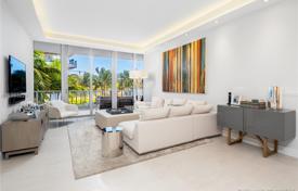 Comfortable apartment with an elevator and a terrace in a building with a swimming pool and a fitness center, Miami Beach, USA for $1,990,000