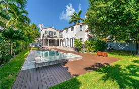 Spacious villa with a private promenade, a pier, an outdoor pool, terraces and ocean views, Miami Beach, USA for $3,249,000
